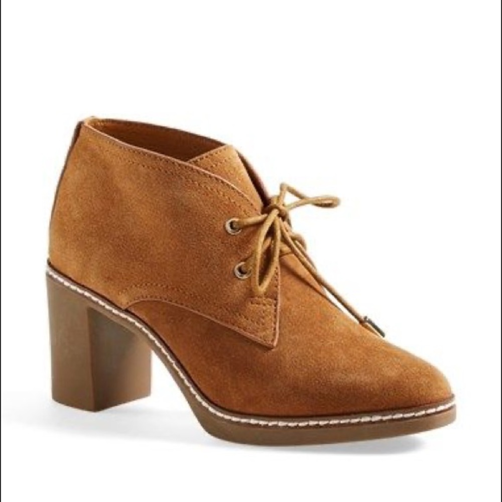 Tory Burch chukka heeled boots with laces.